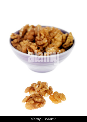 Bowl Of Fresh Healthy Nutritious Walnuts Isolated Against A White Background With No People And A Clipping Path Stock Photo