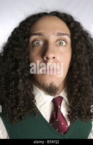 Shaggy haired man in formal attire. Stock Photo