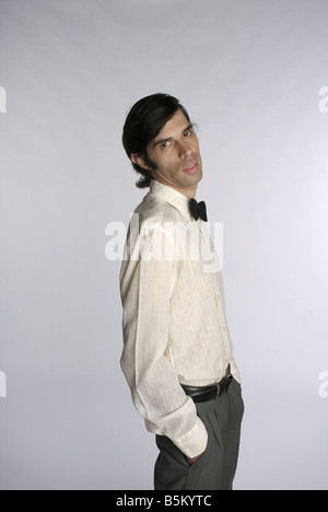 Portrait of a young man with a bow tie. Stock Photo