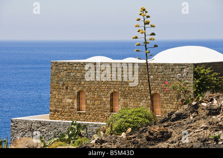 Traditional housing called Dammuso over the sea on the island of Pantelleria, Sicily, Italy. Stock Photo