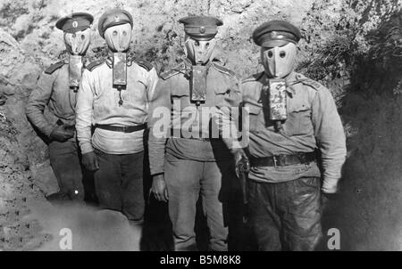 Russian officers with gasmasks WWI 1916 History World War I Gas war Russian officers with gasmasks in a trench Photo 16 9 1916 Stock Photo
