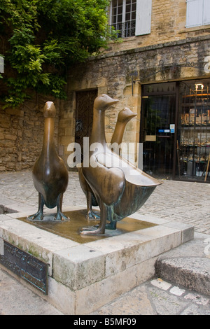 Bronze statues of geese. Place du marché aux oies. Sarlat, Perigord Dordogne France. Vertical.  87301 Sarlat Stock Photo