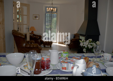 Breakfast setting at the "Artist's Palete" Bed and Breakfast in Les Vignes, Gorges du Tarn, Lozere, Languedoc-Rousillon, France Stock Photo