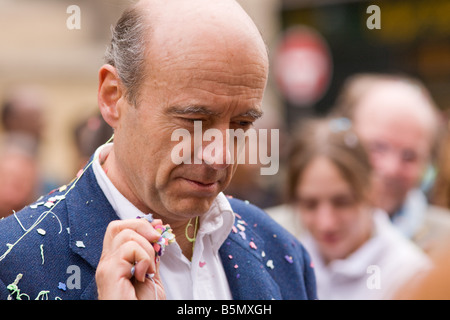 alain juppé, mayor of bordeaux, throwing confetti during carnival festival, bordeaux, france Stock Photo
