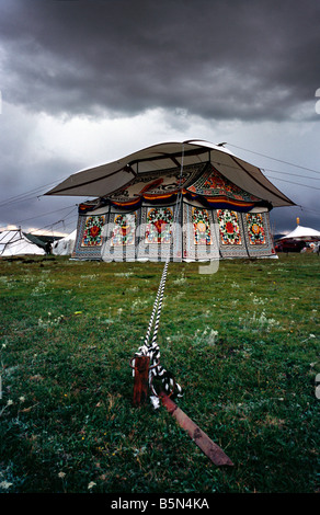 Aug 5, 2006 - Traditional embroidered Tibetan tent with rain cover on the site of the Litang horse festival in China's Sichuan. Stock Photo