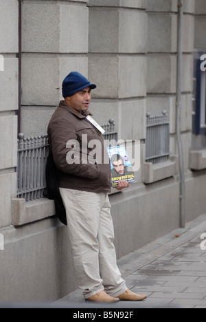 Big Issue homeless magazine vendor Stock Photo