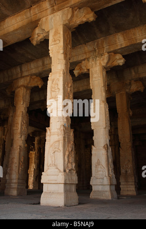 Decorations at the pillars and ceiling of a hindu temple dedicated to ...