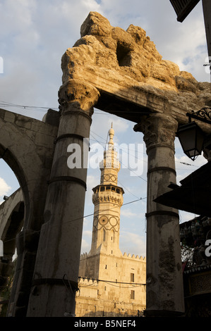 Western Temple gate and Ummayyad mosque Minaret at sunset Stock Photo