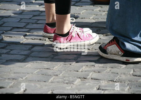 group of teenagers shoes standing in street Stock Photo