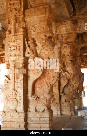 Decorations at the pillars and ceiling of a hindu temple dedicated to ...