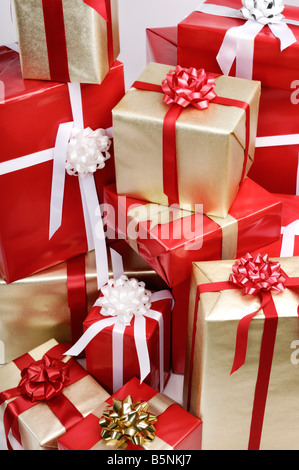 Gifts Boxes Or Presents Boxes With Golden Bows, Star And Ball On Golden 