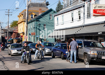 Bikers and Pedestrians on Thames Street in Newport, Rhode Island Stock Photo