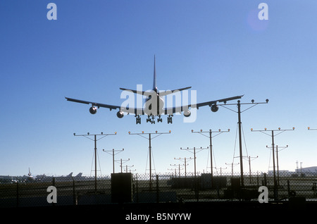 Passenger jet plane lands at Los Angeles International Airport (LAX) Stock Photo