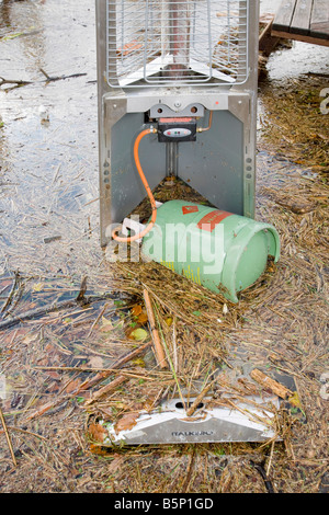 A flooded patio heater at The Wateredge Inn at Waterhead on Lake Windermere in Ambleside UK Stock Photo