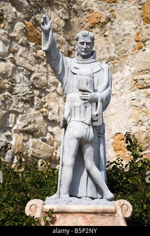 Statue of Father Junipero Serra Indian Boy Mission San Juan Capistrano Orange County California USA Stock Photo