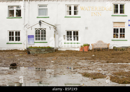 Flooding in the beer garden of The Wateredge Inn at Waterhead on Lake Windermere in Ambleside UK Stock Photo
