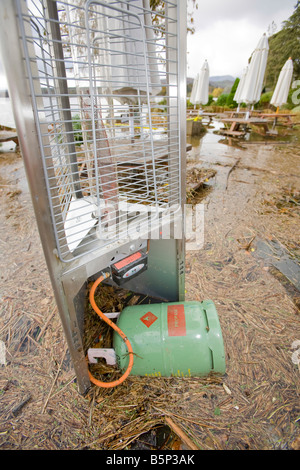 A flooded patio heater at The Wateredge Inn at Waterhead on Lake Windermere in Ambleside UK Stock Photo