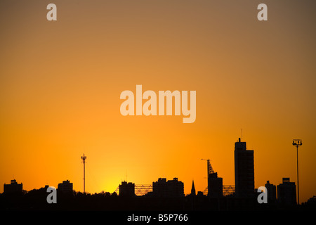 Buenos Aires city silhouette at sunset from Rio de la Plata river. Stock Photo