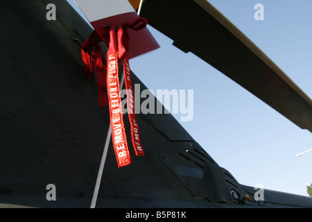remove before flight safety tag on military helicopter at open day Stock Photo