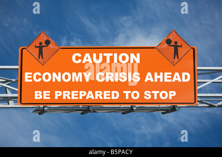 large construction sign white caution economy crisis ahead be prepared to stop on it and two flagger sign on top it. Stock Photo
