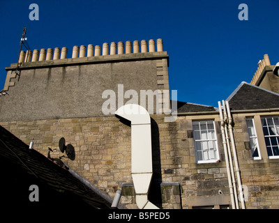 chimney pots and flue on edinburgh house scotland Stock Photo