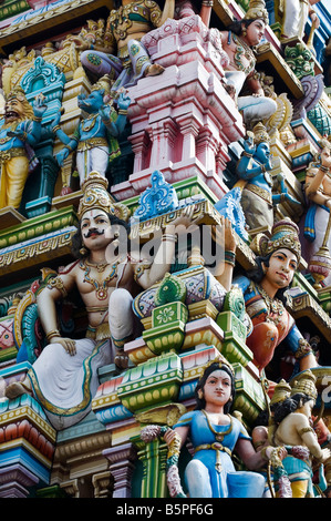 Hindu deities, painted statues, on a temple gopuram in Bangalore. India Stock Photo