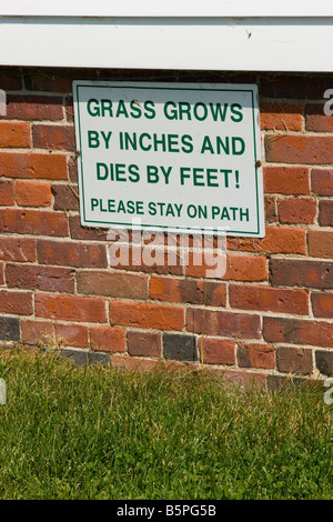 Keep off the Grass Sign in Creative Text Stock Photo