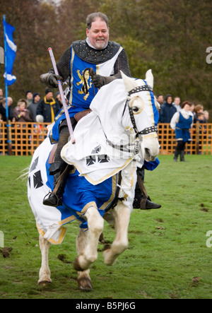 Knight on horseback at a jousting tournament at Leeds Castle Stock Photo