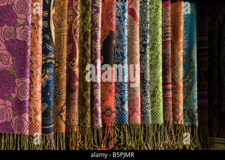 Silk scarves for sale in Aswan Souk a colorful bazaar locally known as Sharia as-Souq, Aswan Egypt Stock Photo