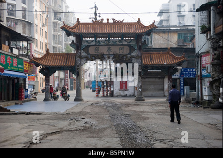 A Chinese man walks along a street in the famous city og Guilin, south China Stock Photo