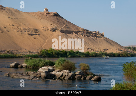 The Mausoleum of Aga Khan III, Sir Sultan Muhammed Shah, who died in 1957 built of pink limestone as seen from the Nile river in Aswan Southern Egypt Stock Photo