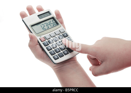 Child s hands holding and pressing button on electronic calculator Stock Photo