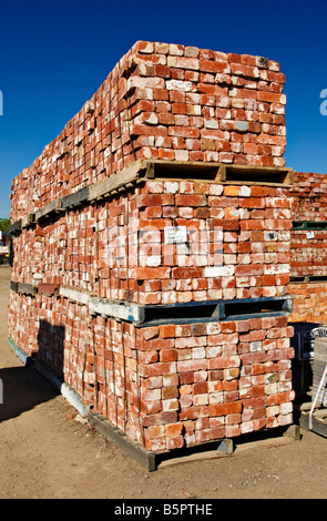 Stacked secondhand house bricks Stock Photo - Alamy