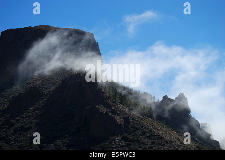 Mist rolling over lava rocks, Los Roques de Garcia, Parque Nacional Del Teide, Tenerife, Canary Islands, Spain Stock Photo