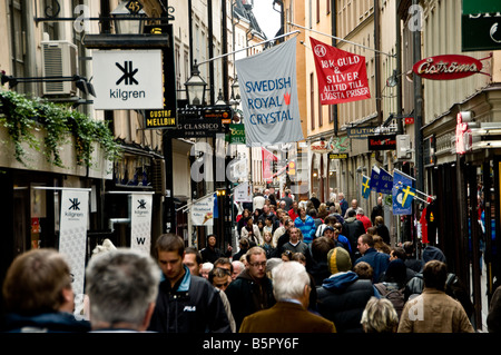 Tourists on a September Saturday afternoon crowding into the narrow streets of Gamla Stan in Stockholm Sweden Stock Photo