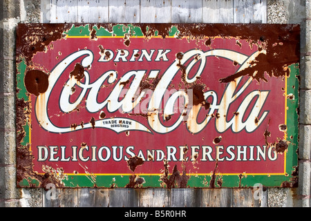 Old Coca-Cola sign on the side of a building Stock Photo