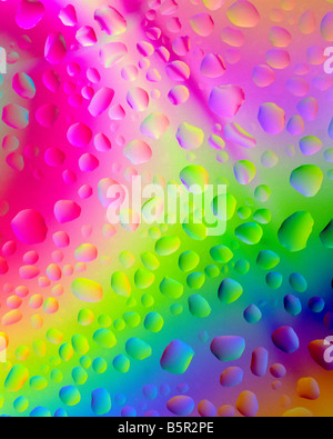 Abstract image of drops of water coloured by cross polarization. Stock Photo
