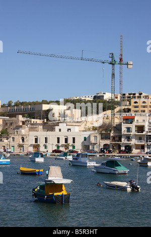 Cranes and building work in Marsaskala, Malta. Stock Photo