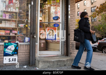 Obama sign in a store window in Harlem, Manhattan, New York City, USA Stock Photo