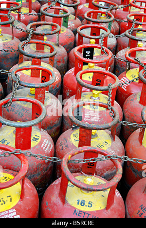 Gas (L.P.G.) cylinders kept in a row Stock Photo