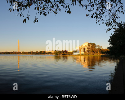 Jefferson Memorial and Washington Monument reflected on the Tidal Pool in Washington DC in the late afternoon sun Stock Photo