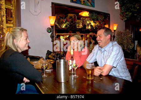 Customers socialize in an English pub in the city of Bath Somerset England Stock Photo