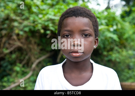 Portrait of an African girl whose education is being sponsored by a humanitarian aid organization. Stock Photo