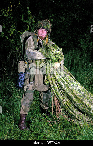 an actor dressed as a D Day  U.S. 101st airborne paratrooper ,Normandy,France. Stock Photo