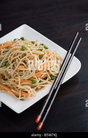 Close-up of noodles in a plate Stock Photo