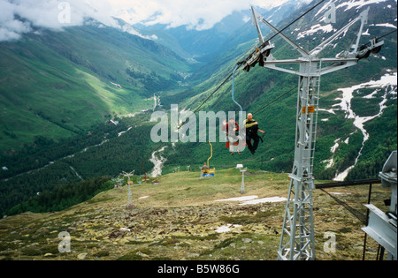 Mountain climbers in ski lift on Mt Cheget, Elbrus range, Northern Caucasus, Russia