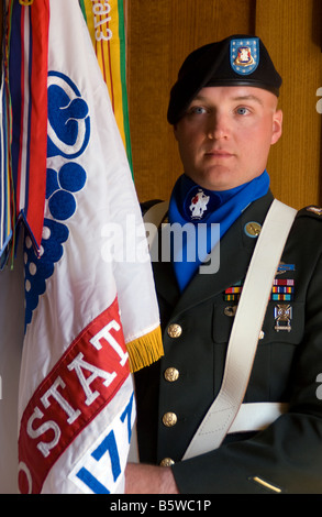 Decorated Iraqi War Veteran, army honor guard displaying flags in San Antonio at Founder's Day celebration Stock Photo