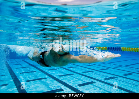 Swimmer performing Freestyle Stroke Stock Photo