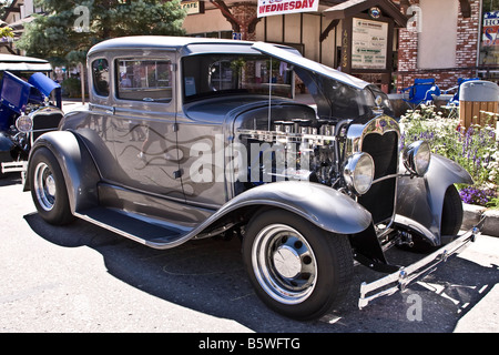 Grey Ford hot rod fitted with a V8 Chevrolet engine Stock Photo