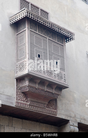 Egyptian style Mashrabiya oriel window enclosed with carved wood latticework of the Gayer Anderson Museum in Cairo Egypt Stock Photo